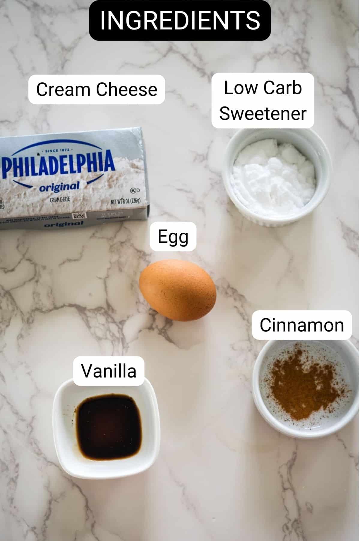 A list of ingredients for a cream cheese cheesecake.