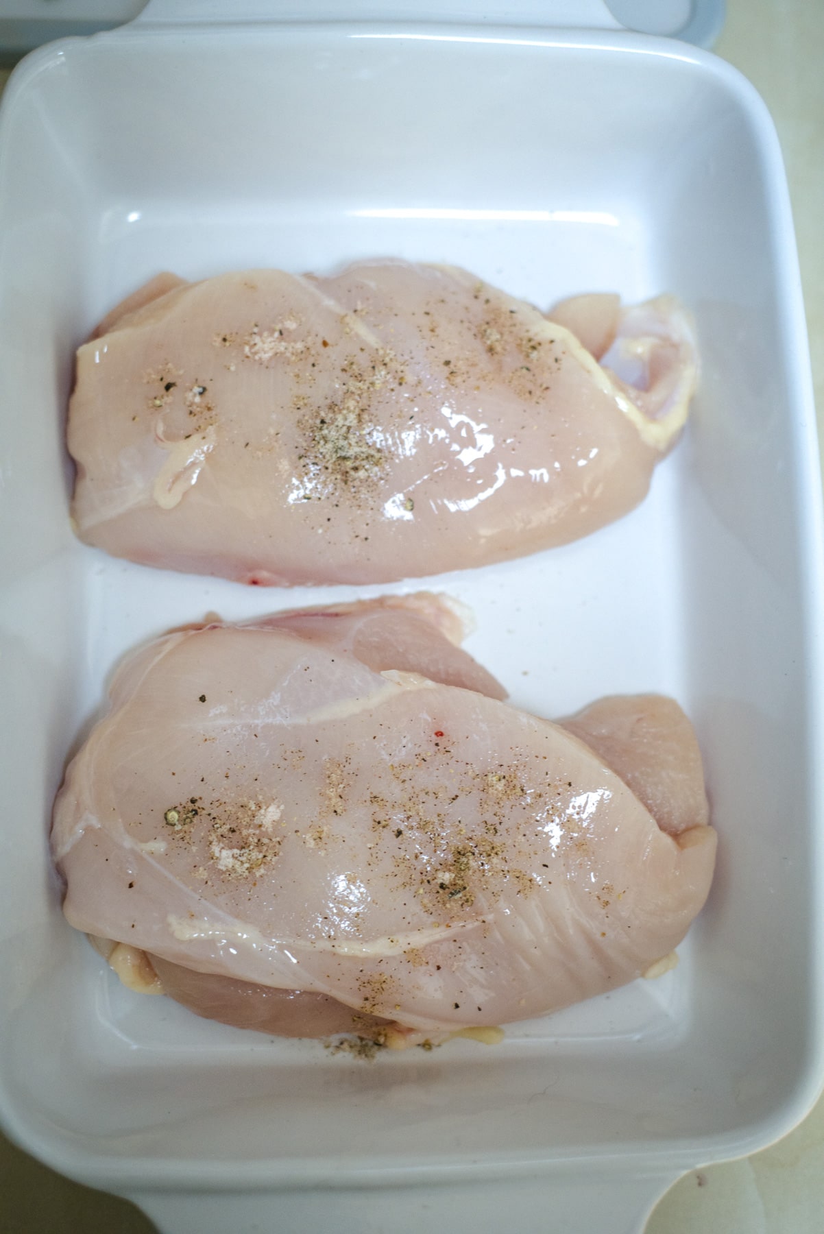 chicken breasts in baking dish