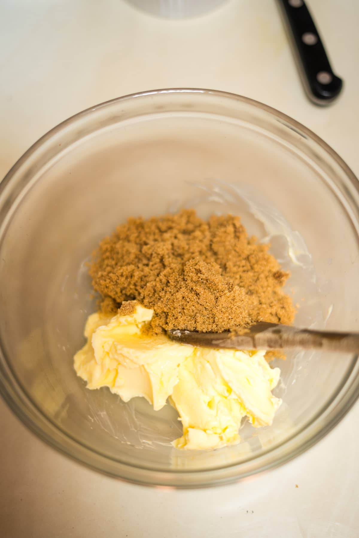 butter and sweetener in bowl
