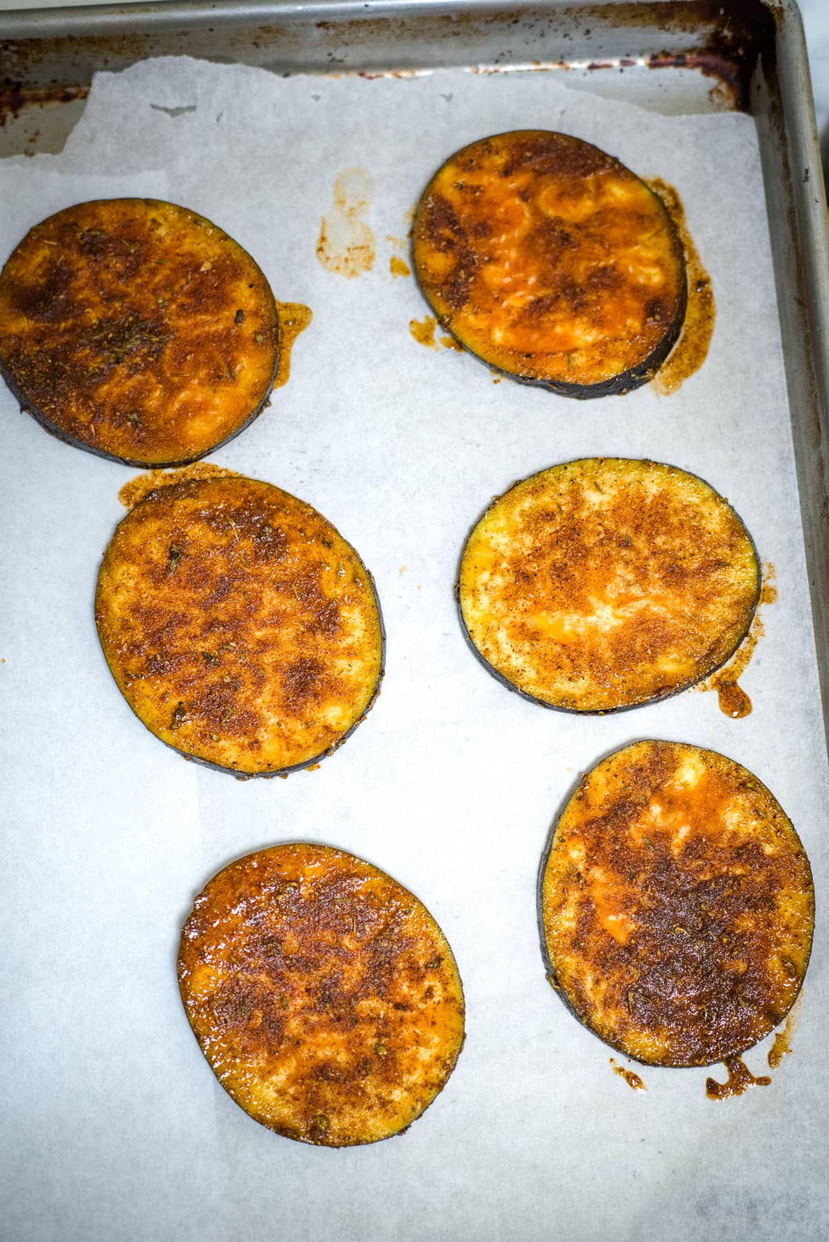 eggplant slices on baking tray
