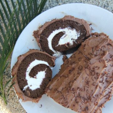 A plate with a slice of low carb chocolate cake on it.