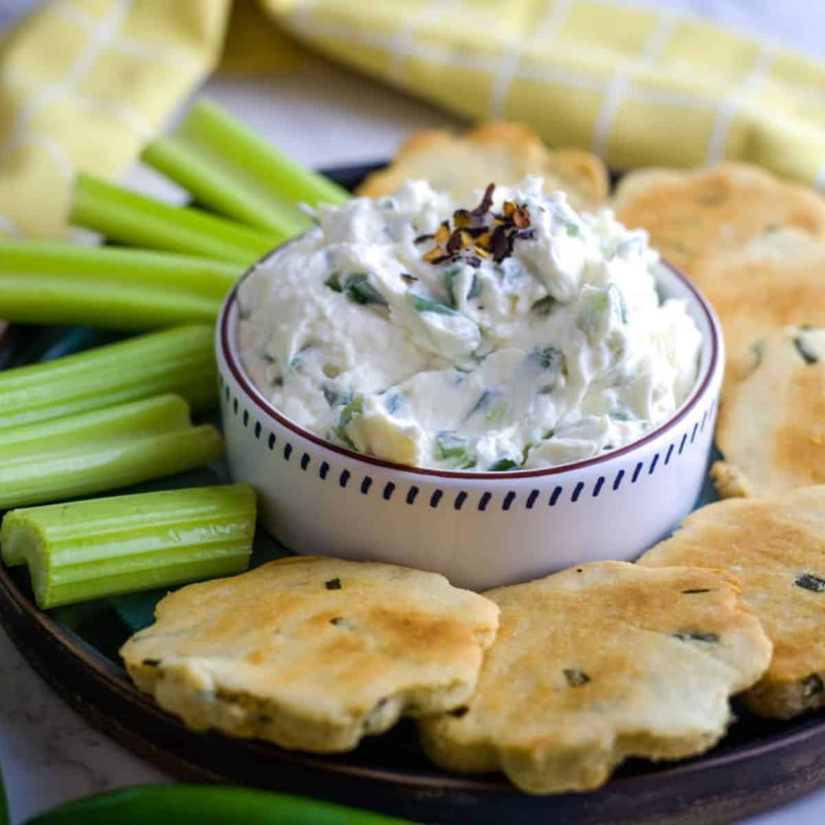 jalapeno cream cheese dip with celery and crackers