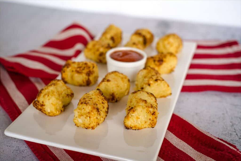 cauliflower tots cooked in an air fryer