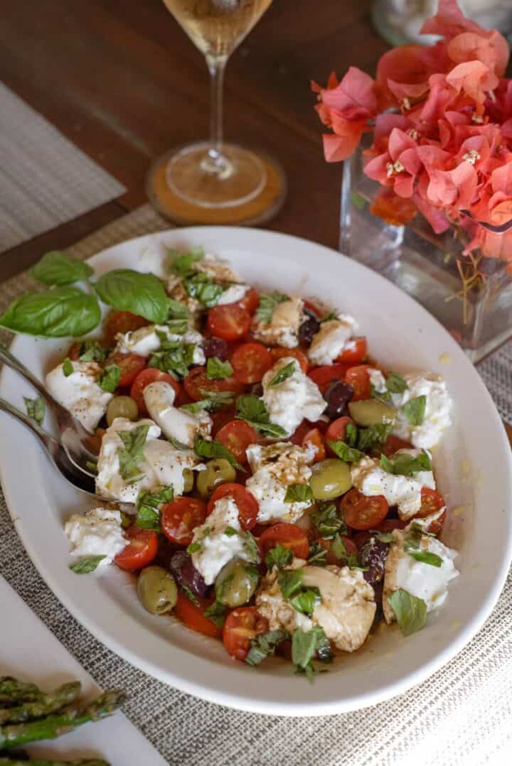 tomatoes and olives with burrata cheese