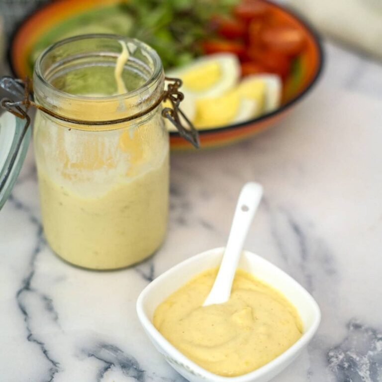 homemade salad cream in a glass jar and serving dish