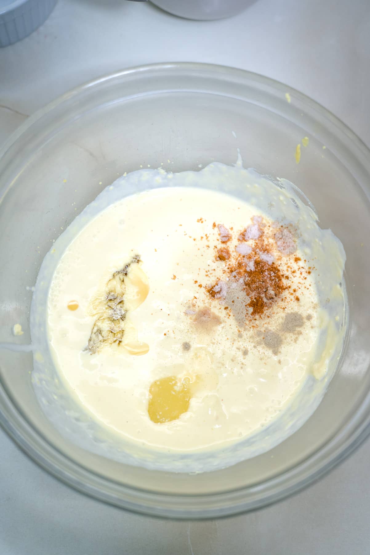 spices and mustard added to cream mixture