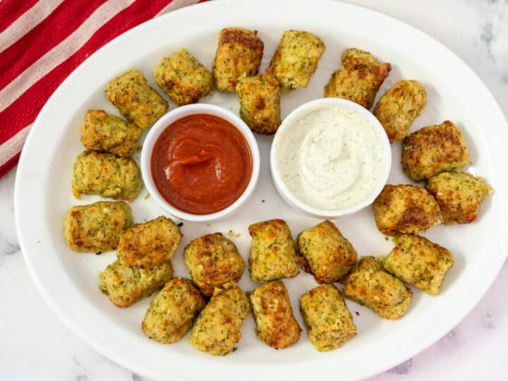 broccoli tots on a plate with dips