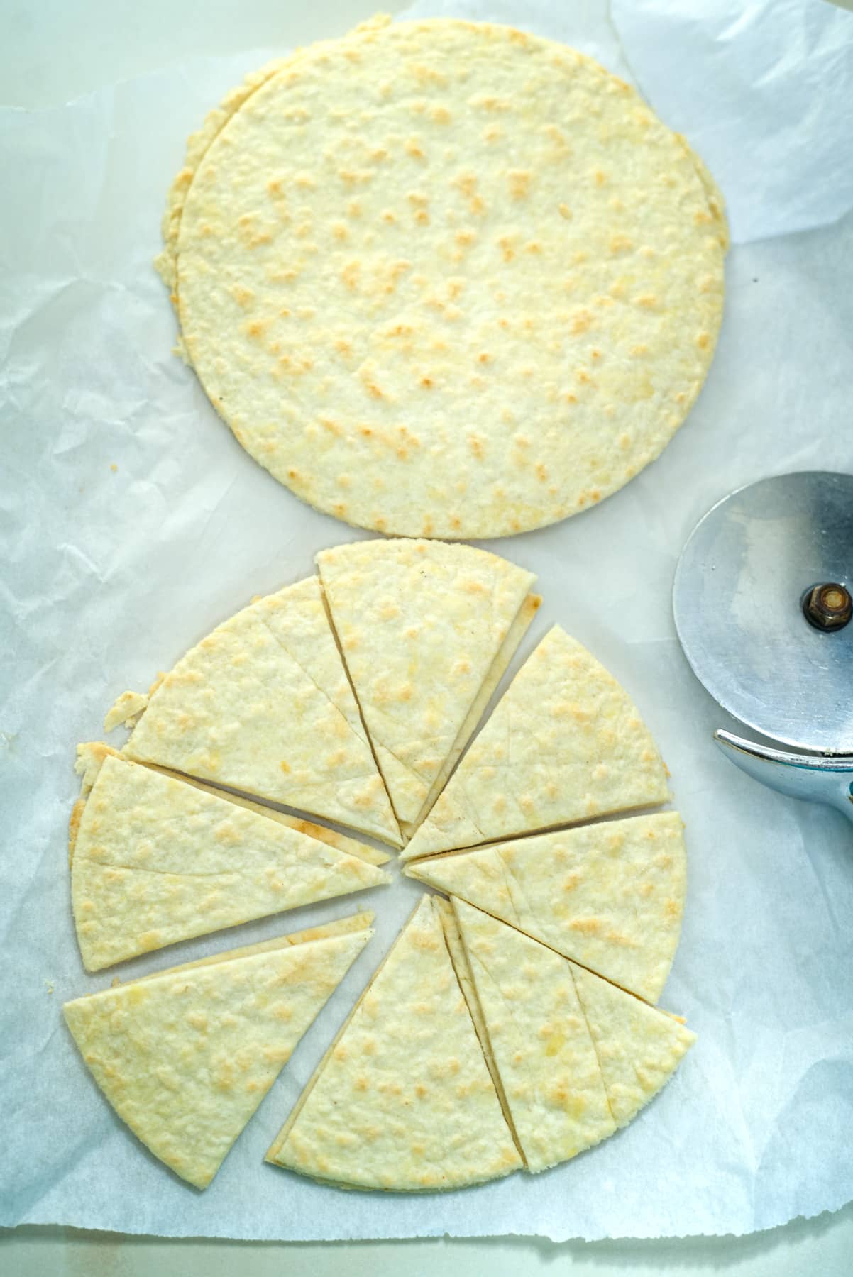 slicing tortillas into chips