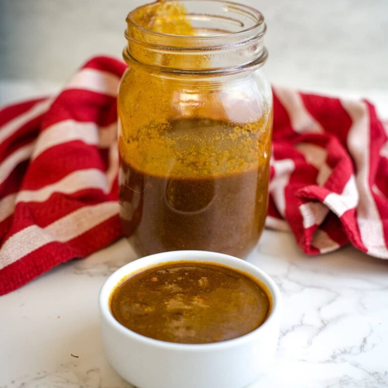 enchilada sauce in a glass jar and small serving dish