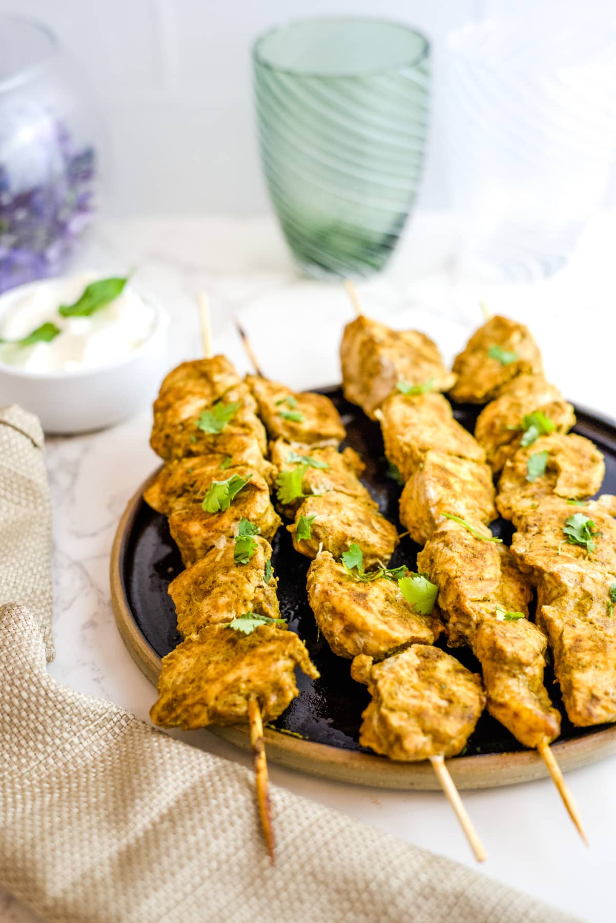 chicken skewers on a plate