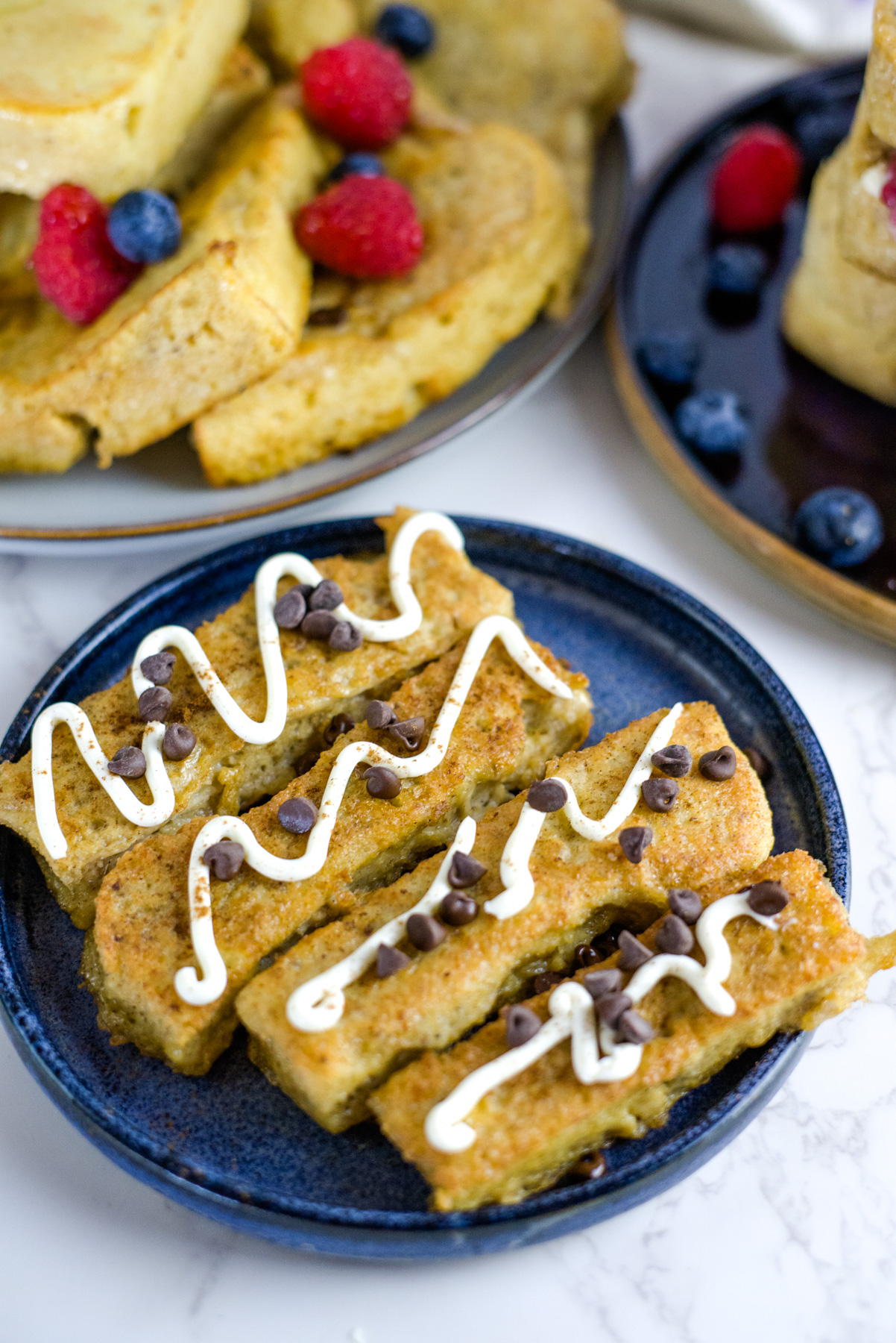 sticks of French toast with cream cheese piping