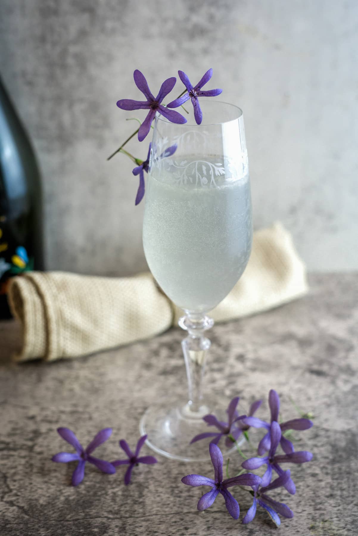 lavender keto mimosa in tall champagne glass