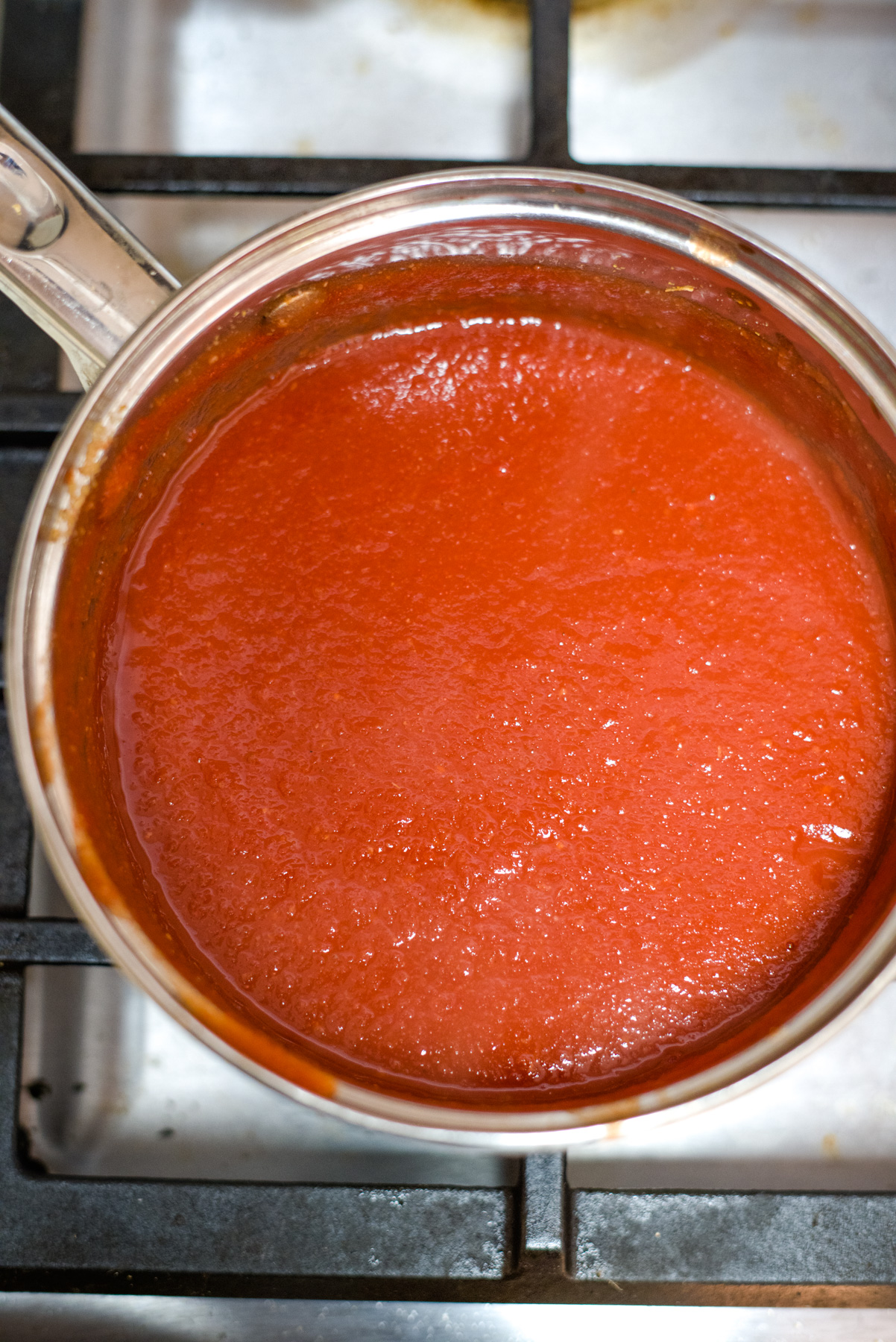 cooked tomato ketchup in saucepan