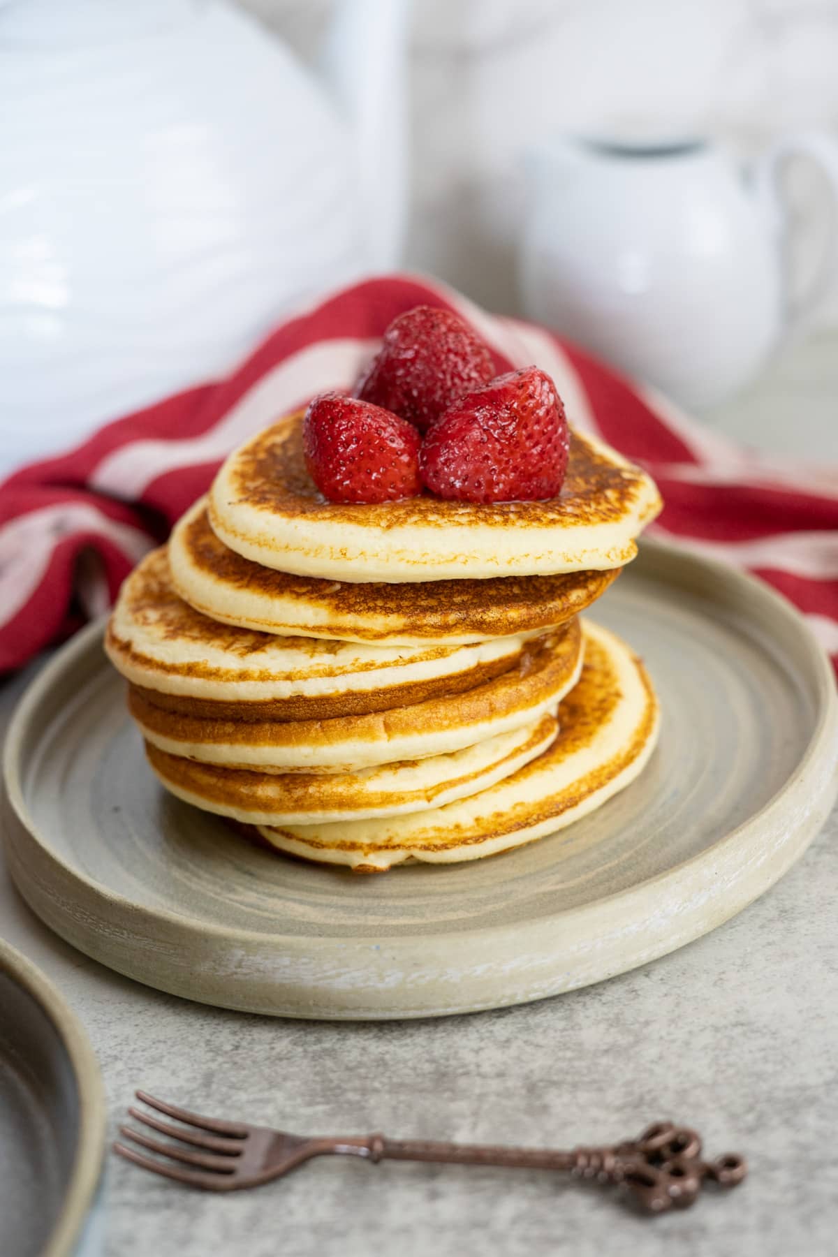 stack of pancakes on plate.