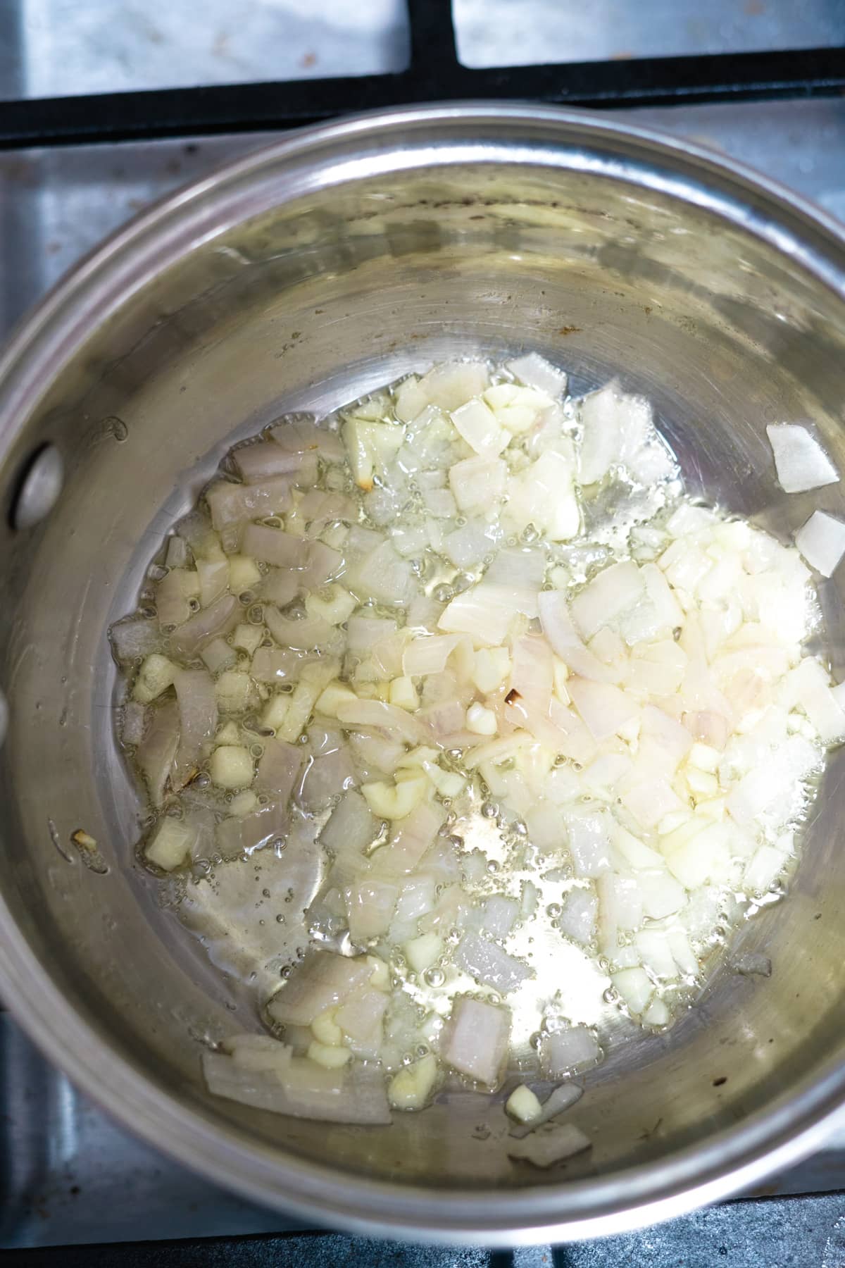 onion garlic in pan