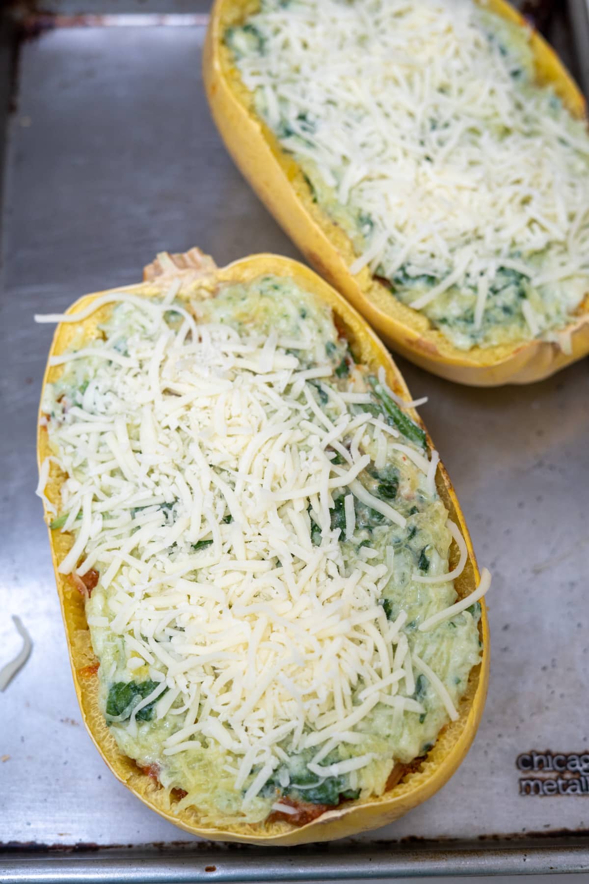 spaghetti squash topped with cheese.