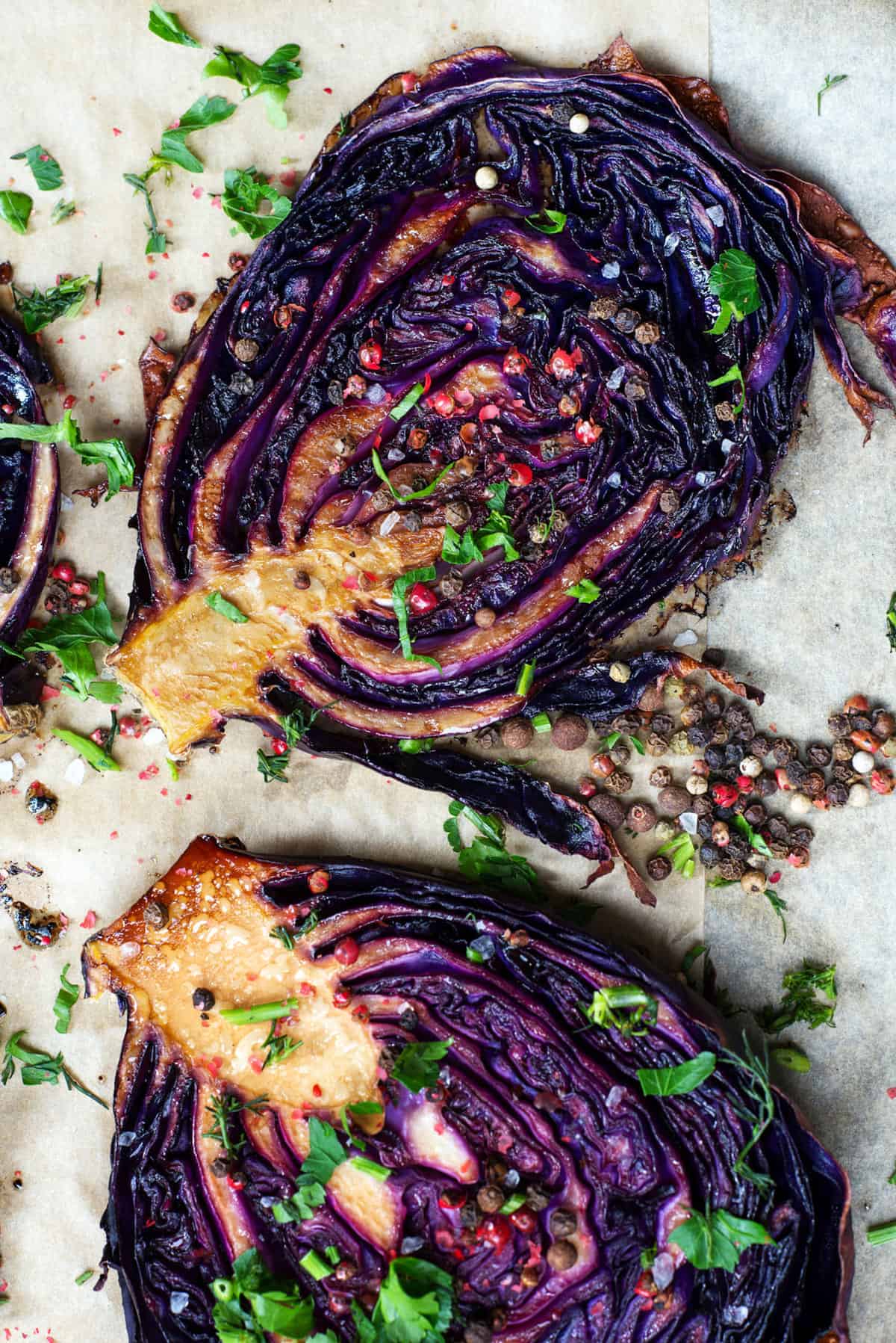 A plate of roasted red cabbage with herbs and spices.