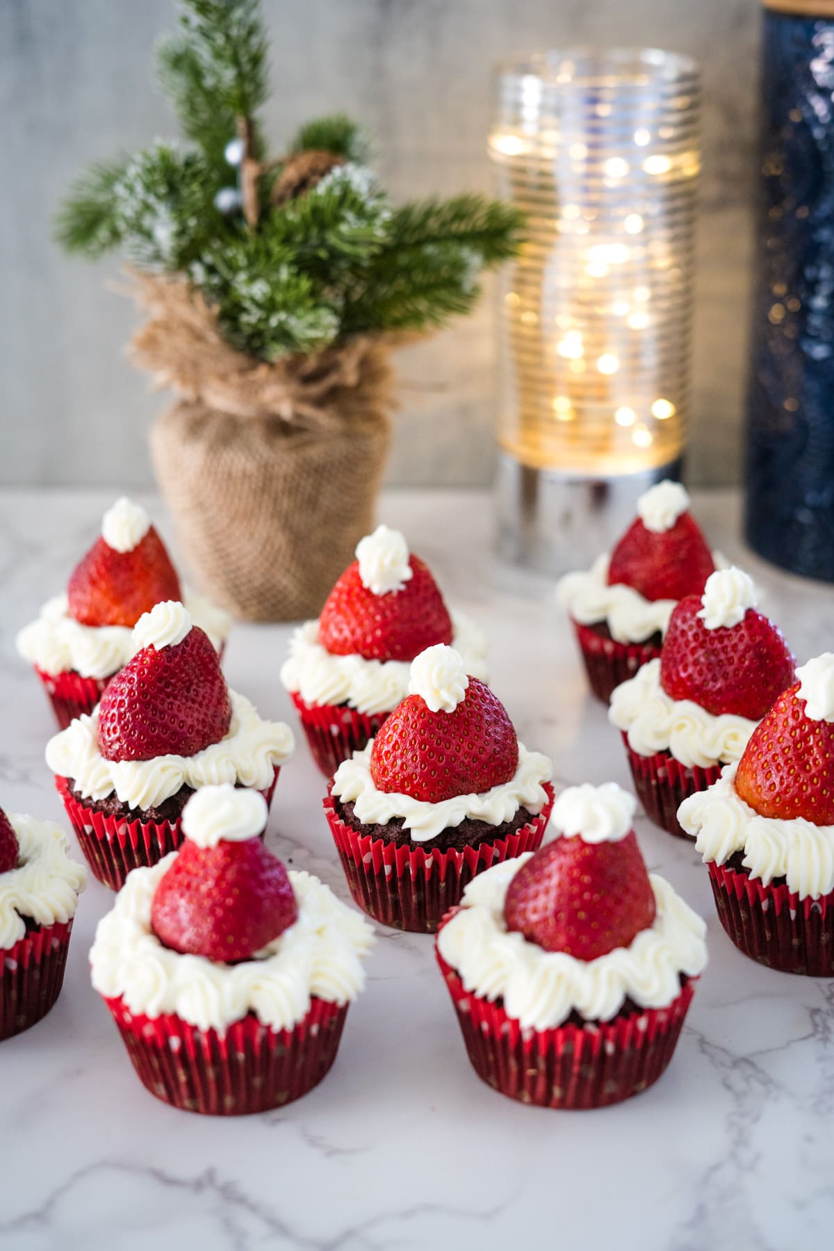 Red velvet santa hat cupcakes.