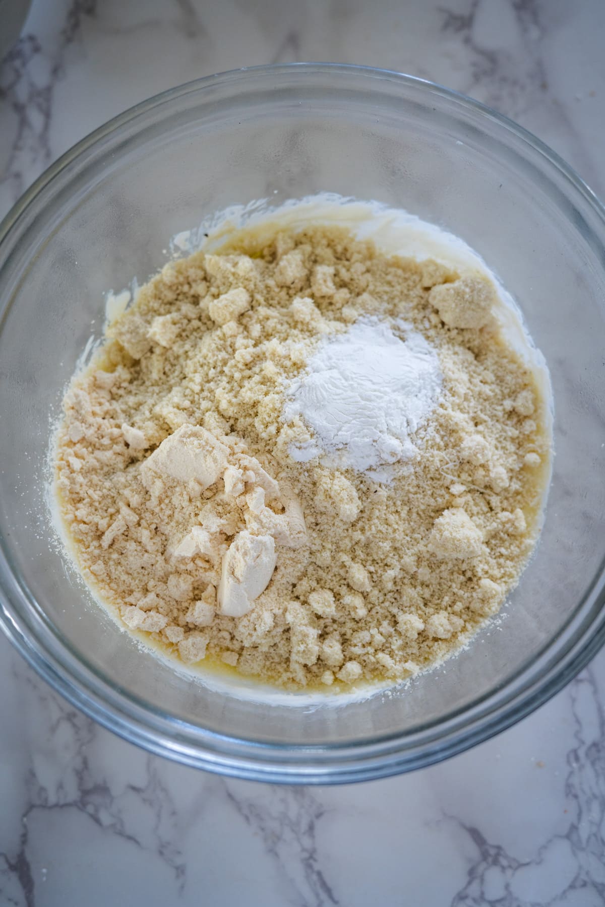 A bowl with flour, sugar, and butter in it for making vegetable wellington.