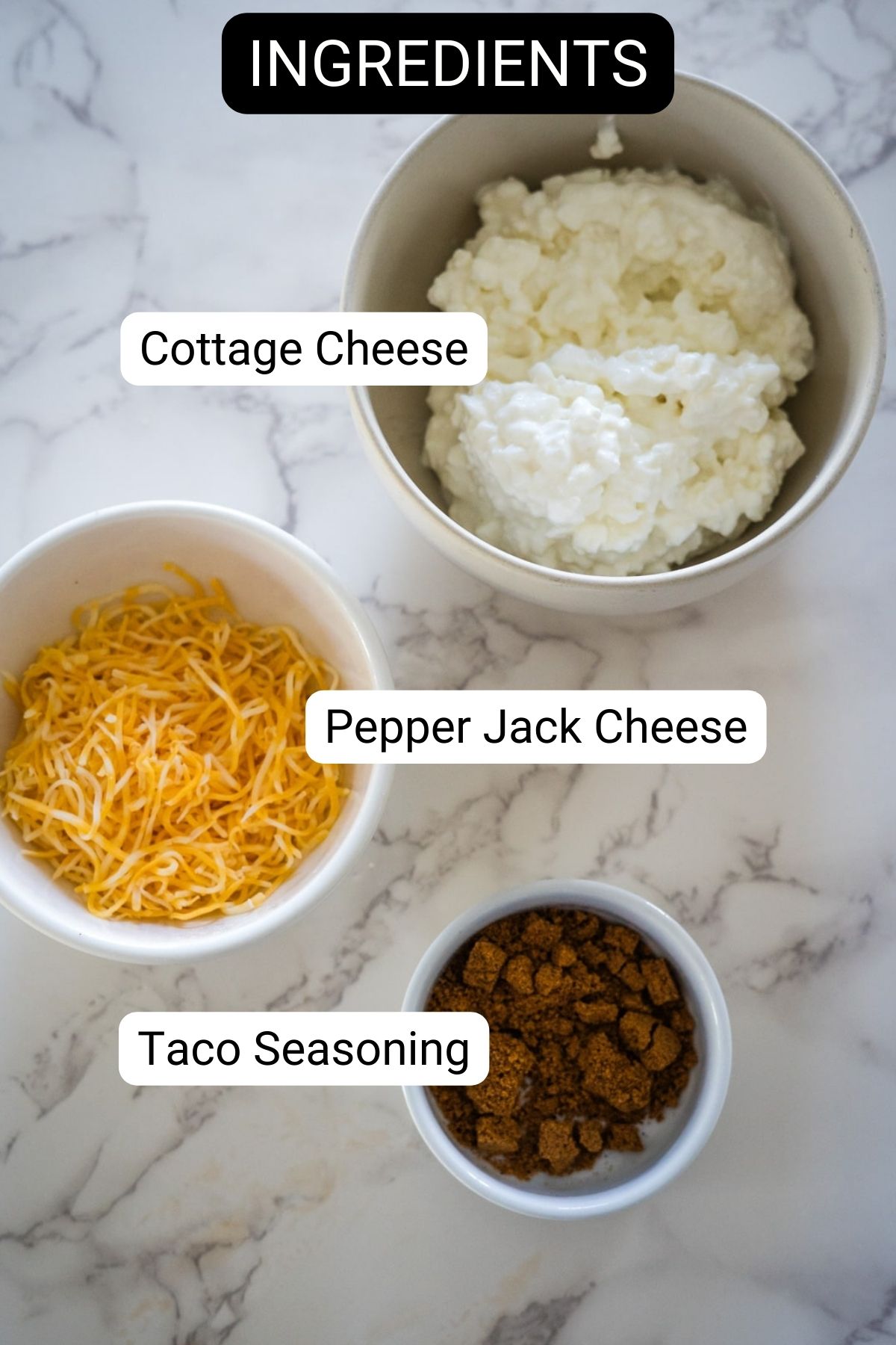 Cottage cheese taco ingredients on a marble countertop.