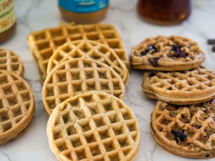 Peanut butter waffles on a white plate.