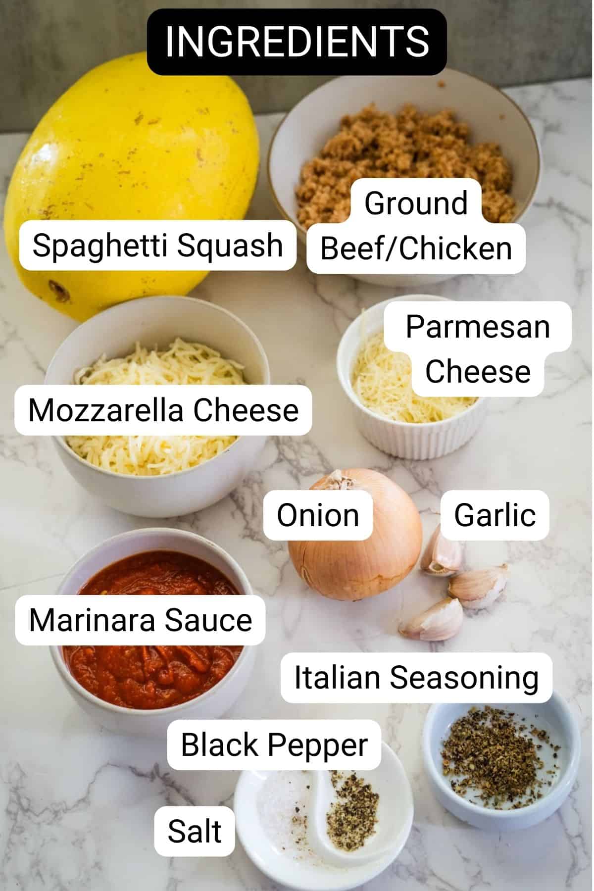 Ingredients for a dish: spaghetti squash, ground beef/chicken, mozzarella cheese, parmesan cheese, marinara sauce, onion, garlic, Italian seasoning, black pepper, salt.