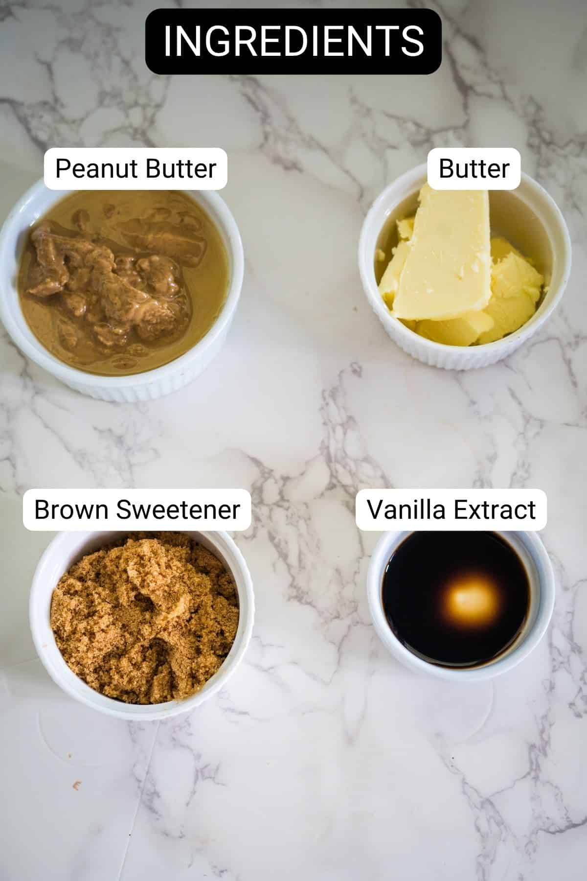 Four bowls on a marble surface labeled: Peanut Butter, Butter, Brown Sweetener, and Vanilla Extract.